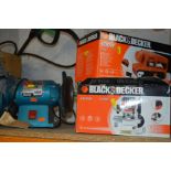 A CLARKE 6'' BENCH GRINDER, a boxed Black and Decker KW850E router and a boxed Black and Decker KA65