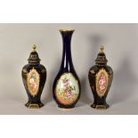 A PAIR OF LIMOGES VASES AND COVERS, with hand painted floral panels and gilt detailing on a dark