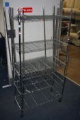A PAIR OF CHROME CATERING SHELVING UNITS (2)