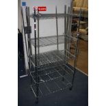 A PAIR OF CHROME CATERING SHELVING UNITS (2)