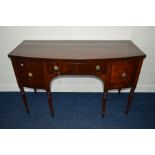 A GEORGE IV MAHOGANY AND EBONY STRONG BOW FRONT SIDEBOARD, fitted with a central frieze drawer