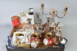 A BOX OF MISCELLANEOUS ITEMS, to include two plated candelabras, a plated candlestick, a plated