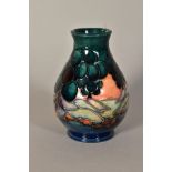 A MOORCROFT POTTERY VASE, 'Mamoura' pattern, impressed backstamp and painted monogram, height 13.