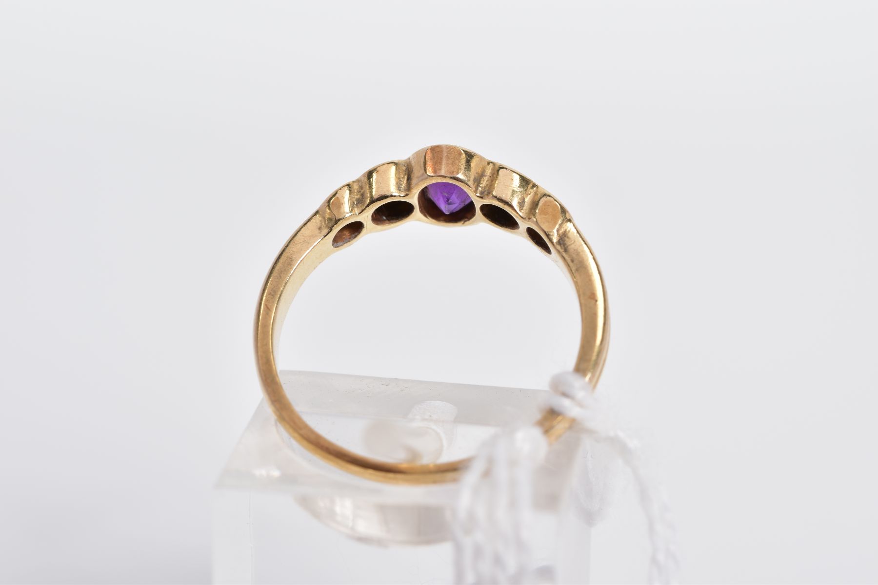 A 9CT GOLD AMETHYST AND DIAMOND RING, designed with a central oval amethyst in a collet setting with - Image 3 of 3