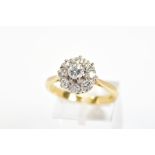 A MODERN ROUND BRILLIANT DIAMOND CLUSTER RING, estimated total diamond weight 0.99ct, ring size R