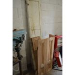 A QUANTITY OF VINTAGE STRIPPED PINE WINDOW SHUTTERS (some hinged together some not) height 121cm