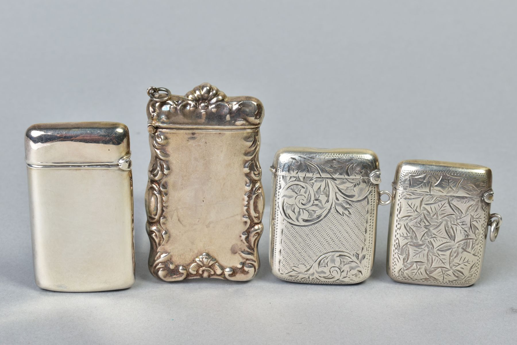 FOUR VESTA CASES OF RECTANGULAR FORM, comprising three hallmarked silver, Joseph Gloster, Birmingham - Image 2 of 2