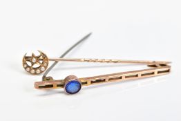 AN EARLY 20TH CENTURY BROOCH AND STICKPIN, the bar brooch with off set circular blue paste in a