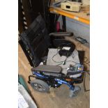 AN INVACARE SPECTRA XTR2HD ELECTRIC WHEEL CHAIR, spares and repairs with charger but no battery