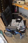 AN INVACARE SPECTRA XTR2HD ELECTRIC WHEEL CHAIR, spares and repairs with charger but no battery