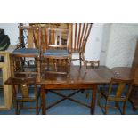 AN EARLY 20TH CENTURY MAHOGANY DRAW LEAF TABLE on a cross stretchered base, extended length 213cm