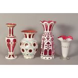 THREE BOHEMIAN OVERLAY GLASS VASES, one with painted floral details, height 20.5cm, another with