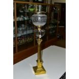 A VICTORIAN BRASS OIL LAMP, corinthian column with stepped base, cut glass reservoir, glass funnel