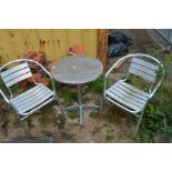 AN ALUMINIUM CIRCULAR BISTRO TABLE, diameter 60cm and two matching chairs (3)