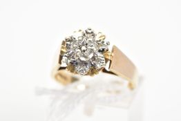 A 9CT GOLD DIAMOND CLUSTER RING, designed as a tiered cluster of single cut diamonds within illusion