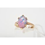 A 9CT GOLD DRESS RING, designed with an oval foil glass cabochon imitating an opal in a six claw