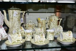 A FRENCH PORCELAIN COFFEE SET, floral and gilt detail, a pale yellow ground, comprising coffee