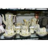 A FRENCH PORCELAIN COFFEE SET, floral and gilt detail, a pale yellow ground, comprising coffee