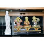 A MODERN FIGURE GROUP OF BUDDHAS, in the See No Evil, Hear No Evil and Speak No Evil positions,