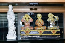 A MODERN FIGURE GROUP OF BUDDHAS, in the See No Evil, Hear No Evil and Speak No Evil positions,