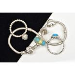 A PANDORA BRACELET AND TWO PANDORA RINGS, the charm bracelet suspending three charms, both rings