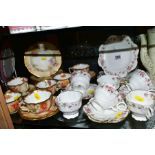 AN EARLY AYNSLEY TEASET, Rd No 334379, floral pattern edging on white ground, comprising six side
