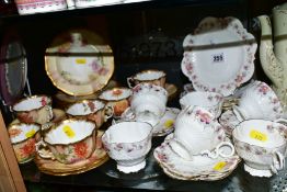 AN EARLY AYNSLEY TEASET, Rd No 334379, floral pattern edging on white ground, comprising six side
