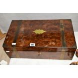 A WOODEN BRASS BOUND WRITING SLOPE, distressed leather, brass escutcheons and cartouche are loose,
