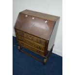 A 1940'S OAK BUREAU