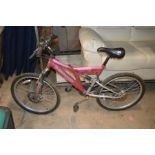A DUNLOP DISC 25 MOUNTAIN BIKE IN DUSKY PINK with front and rear disc brakes and suspension, 24''