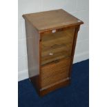 AN EARLY 20TH CENTURY OAK TAMBOUR FRONT CABINET, width 48cm x depth 40cm x height 91cm (no key)