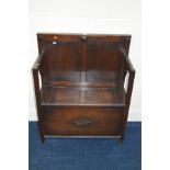 AN OAK HALL SETTLE/MONKS BENCH