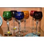 A SET OF SIX HARLEQUIN HOCK GLASSES, etched with berries and foliage (6)