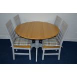 A MODERN OAK AND PAINTED EXTENDING CIRCULAR DINING TABLE, on a pedestal base and four matching