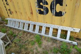 AN ALUMINIUM DOUBLE EXTENSION LADDER all three sectioons are 300cm long with eleven rungs to each