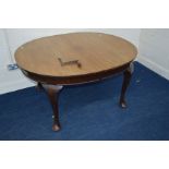 A LATE VICTORIAN WALNUT AND MAHOGANY WIND OUT DINING TABLE, width 137cm x depth 114cm x height