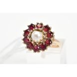 A 9CT GOLD CULTURED PEARL AND GARNET CLUSTER RING, designed with a central cultured pearl in a