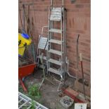 AN ALUMINIUM EXTENSION LADDER both sections 420cm long with seventeen rungs, a ladder stand off, two