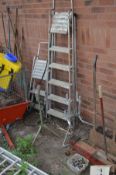AN ALUMINIUM EXTENSION LADDER both sections 420cm long with seventeen rungs, a ladder stand off, two