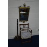 AN EARLY 20TH CENTURY BRASS FRAMED BEVELLED EDGE WALL MIRROR, together with a 19th Century elm