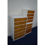 A TALL PAINTED AND STAINED OAK CHEST OF SIX DRAWERS, together with a pair of matching chest of