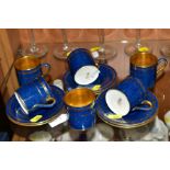 SIX WEDGWOOD COFFEE CANS AND SAUCERS, gilt detailing and interior on blue ground, X8943 to base (12)