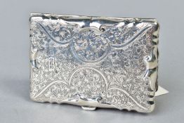 AN EDWARDIAN SILVER CARD CASE OF WAVY RECTANGULAR OUTLINE, foliate engraved decoration, engraved
