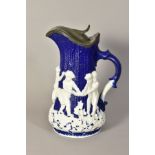 A LARGE MINTON BLUE PARIAN JUG, with pewter lid and moulded with cherubs and ivy, height 30cm (