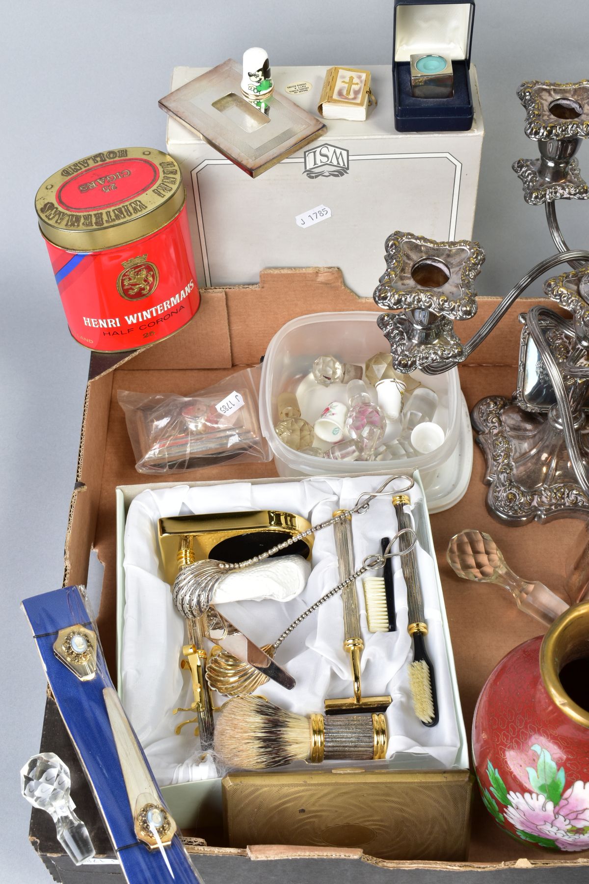 A BOX OF MISCELLANEOUS ITEMS, to include two plated candelabras, a plated candlestick, a plated - Image 2 of 3