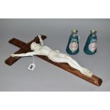 A PARIAN FIGURE OF CRUCIFIED CHRIST, mounted on oak crucifix, height 50cm, together with a pair of