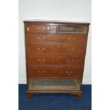 A TALL GEORGIAN OAK CHEST OF TWO SHORT AND FIVE LONG GRADUATED DRAWERS with brass swan neck