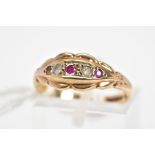 A 9CT GOLD RUBY AND PASTE BOAT RING, designed as a graduated line of circular rubies and