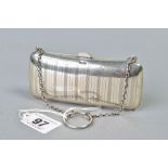 A GEORGE V SILVER PURSE OF RECTANGULAR FORM, engine turned decoration, circular cartouche, leather