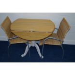AN OAK TOPPED DROP LEAF KITCHEN TABLE, and a pair of rattan and metal chairs (3)
